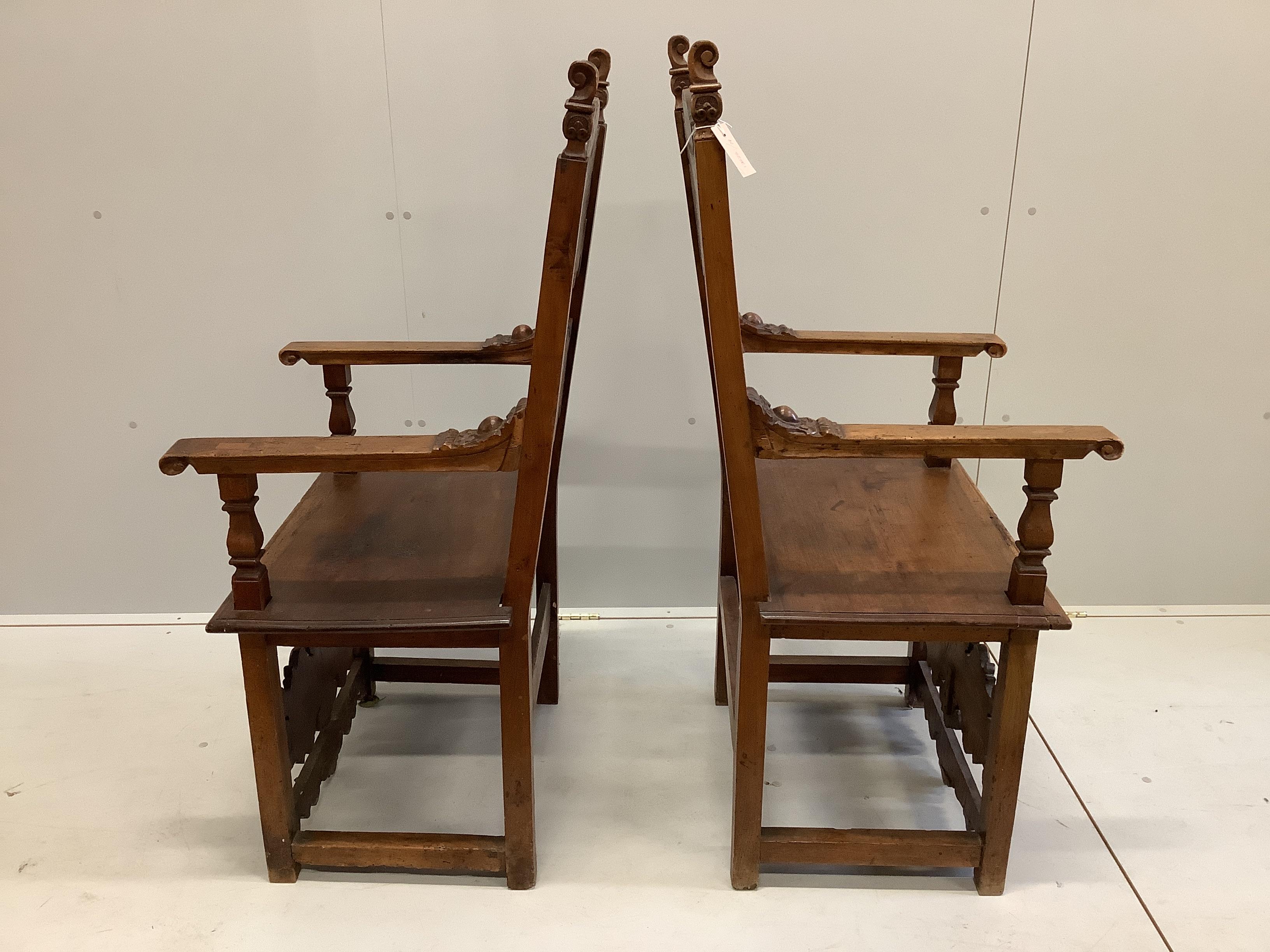 A pair of 18th century style carved inlaid walnut elbow chairs, width 57cm, depth 49cm, height 124cm